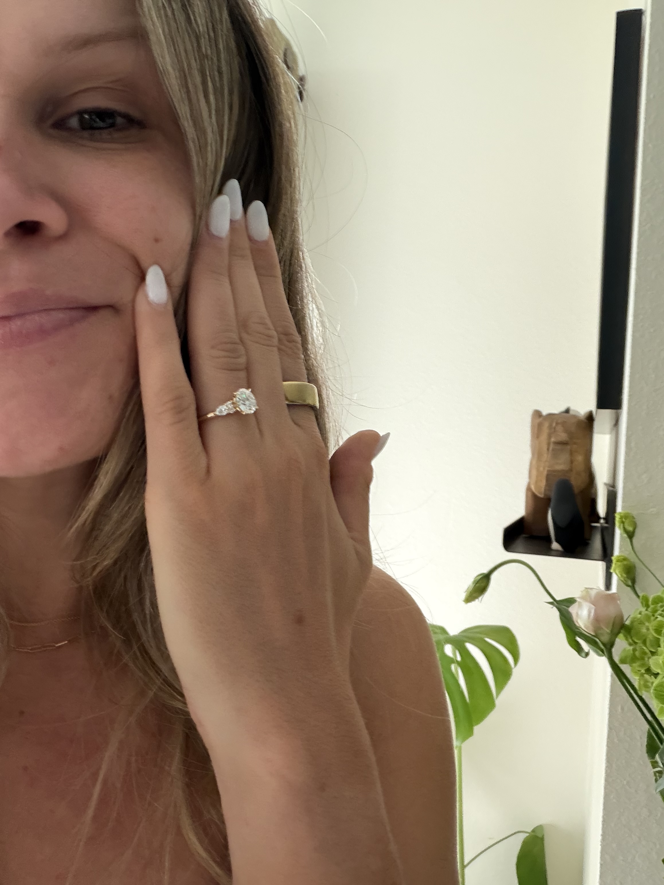 Lindey showing her engagement ring
